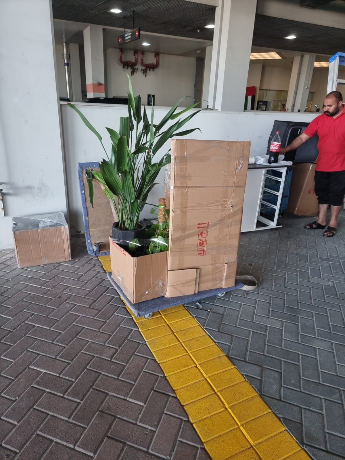 House movers Al Reem Island Abu Dhabi — moving crew reassembling furniture in a new apartment