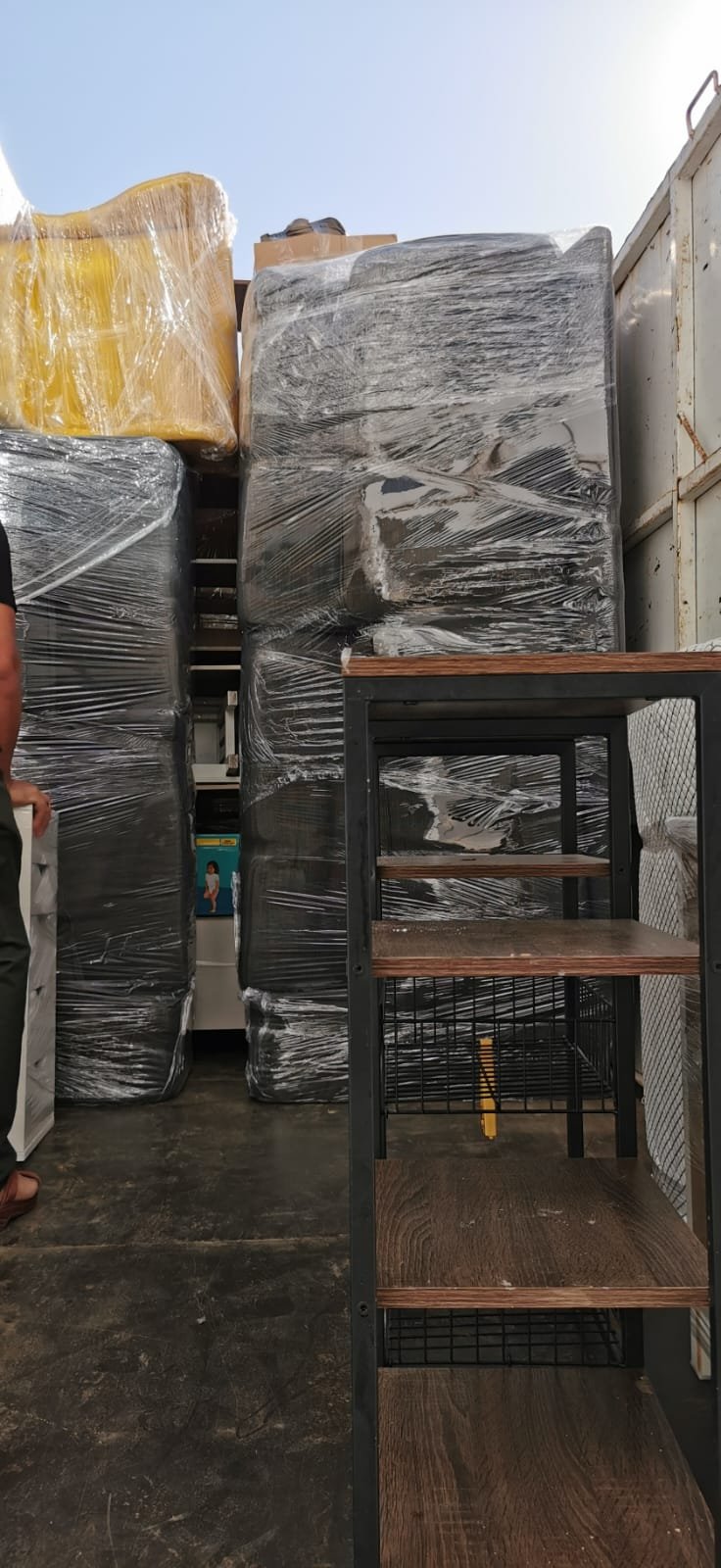 Villa shifting service Abu Dhabi — loading furniture into moving truck